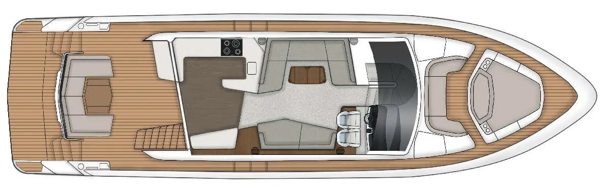 Top view of a modern boat interior with seating, a helm, and a galley area featuring a stove and sink.